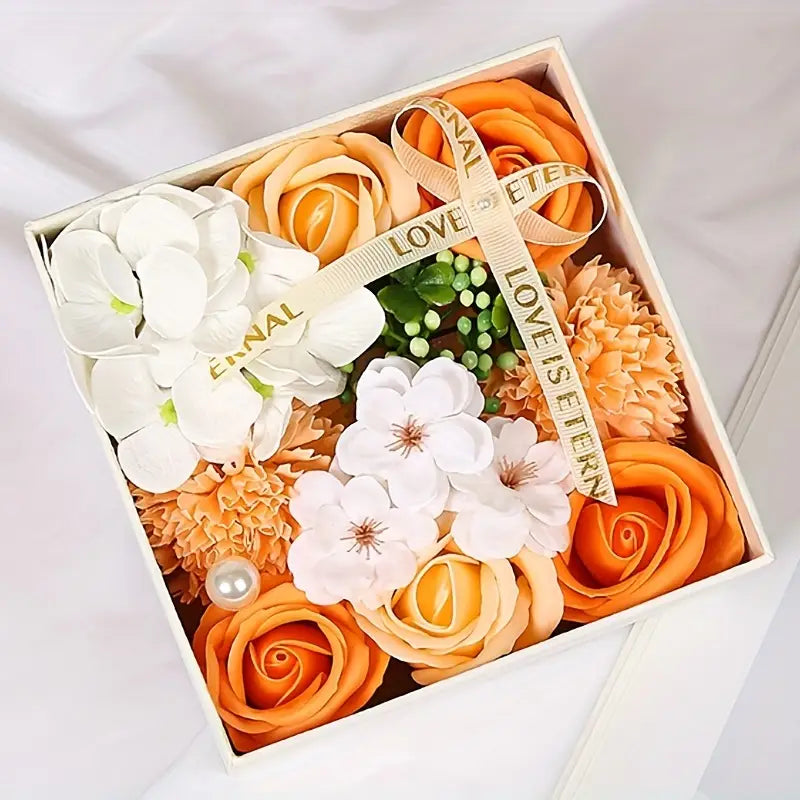 Box of pink and orange soap flowers